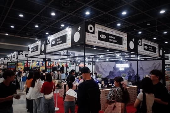 A large Tentseoul booth crowded with visitors